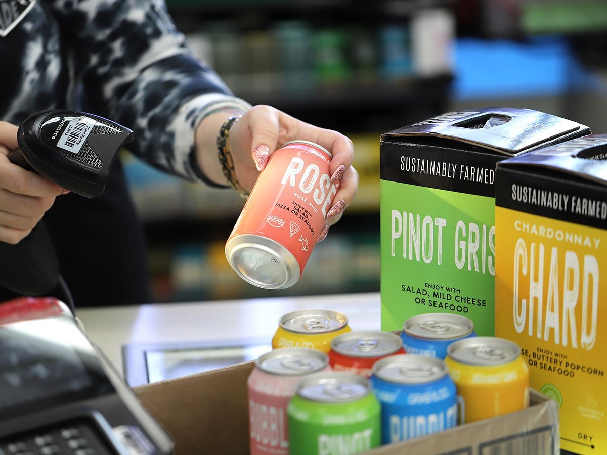 picture of gran n go wine cans being checked out at the store