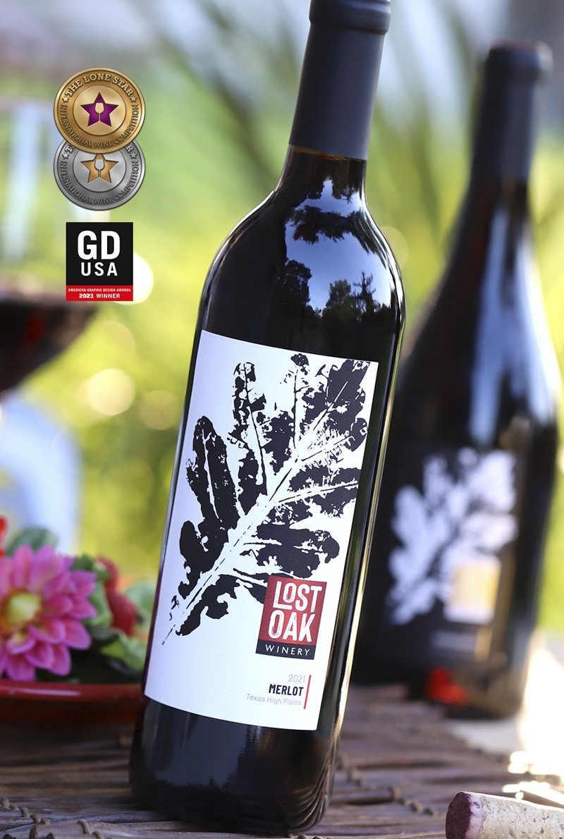 Lost Oak Winery wine label with oak leaf and tree ring illustrations
