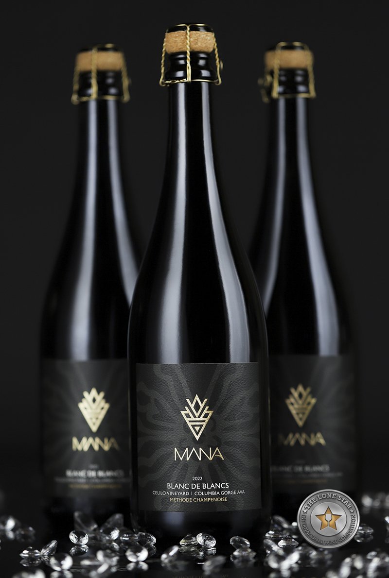 Mana Vintners black wine label with gold foil and stylized Hawaiian flowers