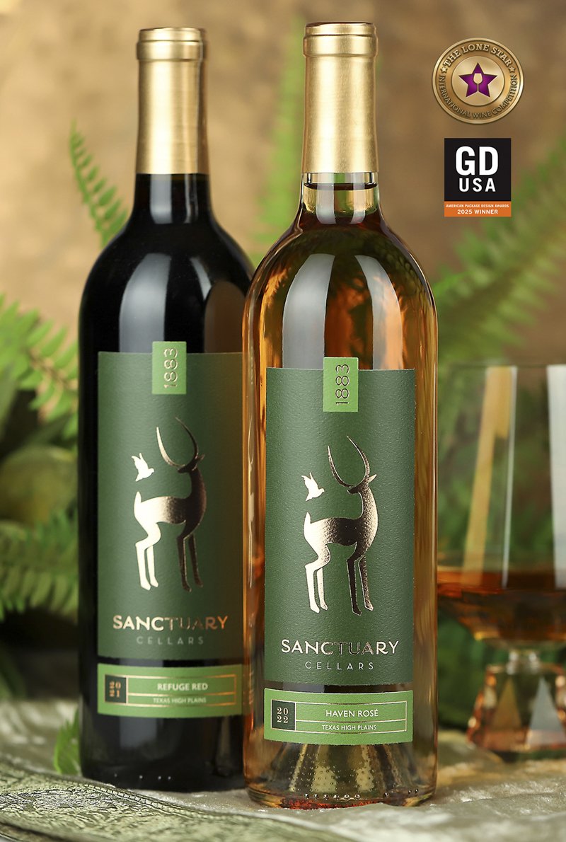 Sanctuary Cellars wine label with rich green artwork, animal imagery, and rose gold foil
